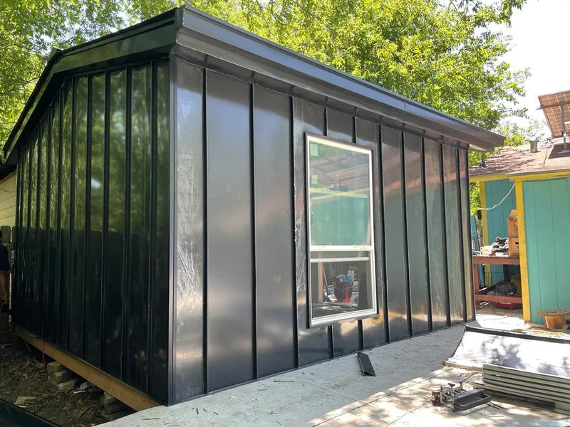 Black standing seam metal wall panels for Metal Roof Installation in Perry Heights