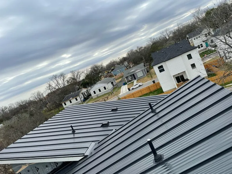 Standing seam metal roof panels with vents for Skylight Repair in Perry Heights